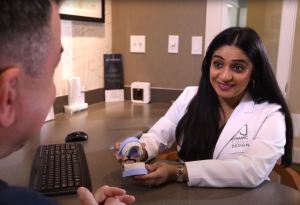 Dr. Patel with Implant mockup for patient 